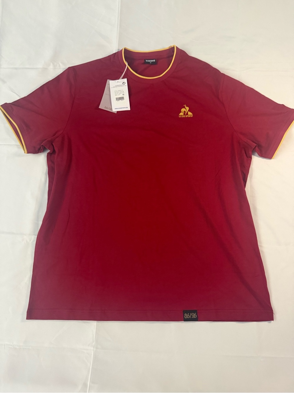 Le Coq Sportif Men’s Burgundy Tee with Yellow Accents